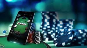 Close-up of slot game reels on ph123 app displayed on a smartphone screen